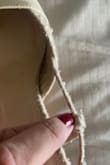 I'll have to cut the fabric hairs before I can use them. The shoes don't look like that in Lulus photos. - CLAUDIA C.