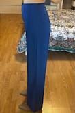I have broomstick legs so this pant was much too wide even though the waist was a comfortable fit, enough room to tuck in a shirt. Pictures are size S and now I exchanged for XS to see if the fit is any better. Super long, need 3+ inch heels or hemming to wear it. Color is beautiful and the inside lining is truly great. - Sofia N.