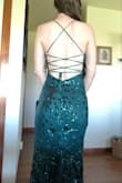 Sequin stunner!! Fit true to size. Love the lace up back, makes it more adjustable. The sequins under the arms are a little scratchy, but that comes with the territory for sequin dresses. I'm 5'5 and it's long on me, will have to get it hemmed a bit. Overall, beautiful quality, especially for the price. - Darcy G.