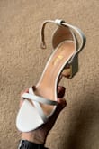 I loved the shoes! They look exactly like the picture and are perfectly comfortable. If you have small ankles, they might move around a little bit, but walking shouldn't be a problem. Perfect height and colors, will wear them again - Leah K.