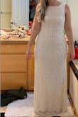 Ended up getting a different dress. The Quality and beading of this dress was beautiful but it didn't flatter my curves at all. I look like a rectangle from top to bottom, maybe I needed to size down. Ended up going with a different mermaid style sheath dress from Lulus. - Laurel B.