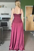 I loved the material and the color. It feels like amazing quality and is fully lined. I like that the slit is kind of hidden so I can keep it more conservative for the family wedding I was hoping to wear it too. The top part however was too big for me. It was very low in the front and kind of open, as I moved you could see bra, so I would've had to pin it. And there was too much fabric in the bust for me, causing some weird bunching in the armpit area. Not super noticeable, but I probably would've wanted to get that adjusted to fit better. I definitely would need a hem (as a 5'2" girl, I knew that was inevitable), but with the issues up top too, it just would've required too much tailoring to get it to fit me well, so I went with another dress instead. Really bummed though because it is beautiful and it was my boyfriend's favorite of the dresses I tried. - Jenna K.