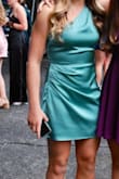 This color is stunning and the fit is very flattering while not being too tight or too short for a High School Freshman at the Homecoming dance. So many compliments. Make sure you order with enough time to have it pressed, can be tricky to do on your own with the pleating. - Marissa C.
