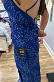 Too loose in the chest and waist. It was a really pretty color though! - Sandra M.