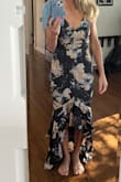 Light material so the ruffles flow. I'm 5'2" so I need to hem it a few inches shorter.  I'm a 32B. I would've liked the cups a little smaller but overall love it. - Lori H.