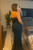 Muscle mommies, size up if you have a wider bust/lats. I'm normally a M or a size 6/8. I ordered both sizes to compare and the 8 was perfect. The bodice fit similarly in both but the bust of the size 6 was too snug. - Carla V.