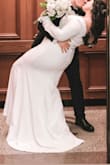 Fit perfectly! I love the elegant style of the dress, the material was soft and comfortable. I hate showing off my arms and shoulders and this dress just made me feel so confident and sexy! I would recommend it to any future bride. - Laura S.