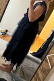 It's pretty and fits okay, but I didn't like the top of the dress, especially in the back. It's kinda loose. - Maggie S.