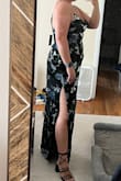 I loved this dress so much and wish I had the confidence to wear it to the wedding I was shopping for. It's very flattering because it has two layers, and the outer layer isn't as tight. The pattern is beautiful. It was a smidge tight on me, but it had a slimming effect. - Maggie S.