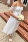 I really love this dress. I got married in this (this September), and the dress was stunning. The material is heavy enough that it feels fancy, and the quality of the dress is perfect. It's comfortable enough to wear all day long and is very easy to dress up with any style of heel. I wore off-white canvas wedges. I would highly recommend. I did not make any changes to my dress. I would happily purchase from Lulus again if had to do this all over. I have always loved their dresses, so it made sense to purchase my wedding dress from them. - Kyanne S.