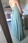 This dress is beautiful, and the lace-up back makes it perfect for adjusting the size. The dress is a bit long and will need to be tailored, but aside from that, I love it - Andrea M.