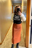 Love this skirt! This is the perfect addition to my fall wardrobe and can be dressed up or down. I also tried this on with a variety of different boot heights/styles and it looks great with all of them. The material is thick and high quality. Absolutely recommend! The waistband is pretty thick and tight though, so if you're debating between sizes and a bit thicker/wider in the waist, size up. - Lindsay C.