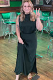 I was worried about the material looking cheap but this dress is super well made. I was able to wear a full bodysuit shapewear and it was invisible under the fabric. I got this hemmed because I'm super short and it was pretty long. Once at the right length, it flowed beautifully. It was also very flattering as I was self-conscious about my upper body and arms. Can't wait to wear it again! - Kelsey D.