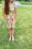 We were a little worried about a bodycon dress considering my daughter doesn't care for anything tight fitting and she prefers to be a little modest in her dress choices. This dress fit like a sheath dress on her and she received so many compliments. She said it was only tighter around the shoulders/arms. - Jennifer L.