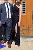 The dress was slightly big up top but I have a smaller chest. Fabric is stretchy and comfortable. The slit was a little high for my taste but I am 5'9". Length was perfect for me though. Got lots of compliments all night! The dress is subtle but beautiful. - Erin W.