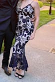This dress was perfect for a wedding, unique and comfortable. A little loose in the middle, but overall fits well. But there is a huge BUT, and probably why it's on sale. The zipper got stuck and then completely broke, so the entire zippered section was open, with the zipper stuck at the top. I was attending a wedding out of town, so I had no backup dress and we were scrambling in the hotel room for a solution. We had to call guest services who thankfully brought us safety pins, and then spent another 20 minutes trying to safety pin me into the dress from the inside out. Luckily we were able to make it work, but we were late and this caused us to miss half of the ceremony. - Liane