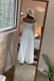 So, we have not had our elopement just yet, but I tried this dress on and was shocked at how amazing it fit! The quality of the material feels like an expensive wedding dress as does the look! It's also extremely comfortable. I am so impressed with the dress that I wish I was wearing it to my actual wedding! I 100% recommend it for whatever occasion! I personally find it very flattering on my body type! - Alexis Z.