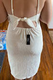 I love this dress! It's perfect for a wedding shower or anything bridal that's not super formal! This dress is super light and comfy so great for warmer weather events! The bottom front is double-lined but the back is a bit see-through so make sure to get a slip or something nude to wear underneath. - Colette M.