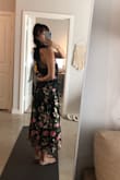 This dress is pretty but it runs SO LARGE. The photo is with me holding in the waist and I'm still swimming in it. Normally I am a size 4 or S but for this dress would go XS or smaller. Definitely size at least one size down. Otherwise, the fabric is good quality and heavy. The embroidery is pretty and the design is super cute. - Helena S.