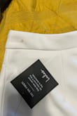 It fit beautifully and it looks amazing. Unfortunately, I got these two pieces with small stains that I had to clean because I didn't have time to make a return. Also, the fabric got bad after the first use. Very disappointing! I paid with the delivery close to $90.00 and won't be able to wear the pants anymore because they are ruined with the wear of one night! - Lilia R.