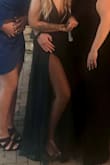 This dress was stunning! Very low cut and fits true to size. Just a little long. - Amy M.