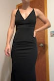 I love how the dress fits the model, giving her a snatched waist, but for me wearing a small, I had 3 inches or so of fabric and looked more like a loaf of bread instead of little miss hourglass. I did not have enough time to exchange it for an XS, but the material was stretchy and comfortable. It just didn't fit my body type! - Allison D.