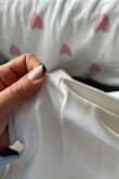 The dress fit very well, but in the middle of lunch, when I went to the bathroom, I noticed that it started to unravel. Then when I got home, the same thing was happening to the waist part as well. - Juliana A.