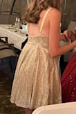 My 14-year-old daughter with an athletic build wore this to an event where she had to wear a gold dress. It was a nice color but heads up that the sparkles do come off, although it isn't too bad. - Andi S.