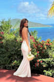 For the price, I was absolutely shocked at the high quality of this dress! It fit me perfectly and looked like an expensive dress. The all-over lace was gorgeous, and I love the lace up back. It was actually comfortable to wear all day and was very lightweight. I wore this for our beach wedding in St Thomas, and my husband was obsessed with me in it! Got tons of compliments as well. I did shorten the train and added 2 beaded appliqués to the bust area just for some added sparkle. With some stick-in cups, it enhanced me just right! Totally made the best decision picking this gown! - Kim H.