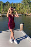 Ordered this for homecoming. The stock photo looked a bit mature for a 16 year old, but it's actually really cute! It's lined, and the sequin layer is looser, like some ruching so it's not too tight. We did pinch the straps together in the back, but that was the only alteration needed. Great quality, beautiful color, nice fit, the order came quickly and we're really happy with the purchase. - Jennifer V.