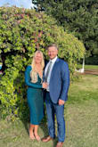 I purchased this dress for a wedding in Italy. The material almost changes colors in the light! It's a very sparkly blue with stretchy material that hugs your curves. - Marti C.