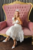 I adored this dress for my bridal shower! My ladies threw me a high tea bridal shower and it was perfect for the vibe! I wore it with a fascinator and got so many compliments. The 3D floral overlay is a little stiff since it's textured so it's not a streamlined silhouette. - Natalie M.