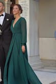 Beautiful dress, lots of compliments. It was a bit windy that day, so my underwear would appear at times, and I had to be careful... Maybe adding a pin or something to keep the split tight together would work next time.
Overall, I loved it! - Georgia L.