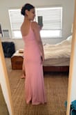 I LOVE this dress! The fabric plus the 2nd layer of lining add a little weight to it but it felt so high quality. I had it hemmed a bit plus a slit added to make it a little more fun. I didn't have to wear a bra with it and a Medium fit me perfectly! I always usually fall between a S and M. Had it been a looser style, I would've gotten a Small but for the fitted design, snug fabric, plus having a larger bust, a M was perfect. Highly recommend!! - Veronica D.