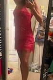 I really like this dress and it was pretty flattering too. It is too short for me and I would not be able to bend over at all while wearing this.
The other problem with the dress I received, the fringe was sewn into the zipper, so I had to pull it over my head to wear it. - Tasha Q.