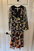 Absolutely love this dress! Got so many compliments. I'm usually more of a size M but S was perfect. Things to note: a bit scratchy on the arms but I forgot about it pretty quickly. And some of the flowers could be sewn on a bit more - I tried to use double-sided tape to keep them down more. That being said I think the dress is amazing! - Elizabeth S.
