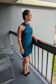 I received many compliments on this dress at a recent wedding. People loved the neckline and color.  It runs small, especially through the hips. I recommend sizing up. - Megan S.