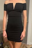 I was super excited to order this dress and thought it would be super cute, but it's just a little boring. It wasn't made for my flat-chested gals. It is sleek and a great neutral! It's definitely comfy too! - Camryn C.