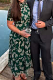 This fits so nicely! I'm short and didn't want to deal with getting a dress hemmed, so the length worked out really nicely for me. got a lot of compliments! this did show sweat (after sitting through a 90-degree wedding ceremony), but the sweat marks didn't stay through the night which was great. - Michelle D.