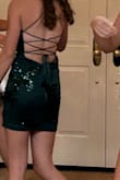 My 15 yr old daughter loved this dress! The bust was padded which was awesome and the back detail was so cute with the ties. She said it was comfy too. - Rachael R.