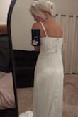 It was a beautiful dress that fit lovely up top. Love the fabric and sequin! However, I don't think the bottom of the dress was flattering on my figure. - Chelsea T.