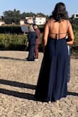 A great dress. It's very long and will likely need a hem. Oddly enough, the original hem was crooked so it needed to be tailored. Very complementing and flows nicely. - Natalie C.