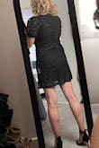 This is a very cute dress, BUT it is not fitted around the waist as shown on the model. It hangs straight on the sides, not giving much shape.  Also, I figured because she is taller it would be longer on me since I'm only 5'3" but it is very short. I can not order a smaller size.  Overall, a pretty dress, just beware of the length. - Cindy D.