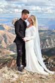 Strapped this baby to the outside of my pack and hicked it up a mountain for my private wedding ceremony and it did not disappoint. I'm 5'4", 140lbs, and the dress fit like a glove except for in the chest. It wasn't gaping by any means but it did feel slightly looser than the rest of the fit so I imagine it could definitely accommodate bigger busts. The fabric is on the heavier side and STRETCHY! It feels so nice! It does have a liner and I was worried I would have to pull it down constantly so it wouldn't crinkle and show in photos but I actually didn't have any issues with that. I love the wide neckline and plunging back and the buttons trailing down the back add such a beautiful touch! The dress was very long on me but given our situation, I wasn't going to be walking around in it so I didn't bother to have it tailored. Very happy with how it turned out, especially with such a reasonable price tag! You can't beat that! So gorgeous!!! The white opalescent flower earrings were from Lulus too! - Vada C.