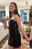 This dress fit very well, and it was super cute. The sequins held up very well after lots of dancing and moving around. The zipper was a little tricky to get up and down, but other than that, it was great for homecoming! - Maddie T.
