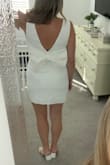 This dress is lined, not see-through, and feels great on. I love the back and it's not too short on me at 5'9". - Jennifer H.
