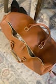 The bag is really cute, but the zipper broke the very first time I used it. Very poorly made. Disappointing I bought it on sale, and cannot return it now. - Hayley H.