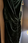 This dress is gorgeous. The color and style were perfect for an elegant wedding I attended on a cool fall day! The ruching is forgiving and the slit makes the high neckline dress sexy. Very comfortable and easy to wear dress. I received many compliments! - Debra C.