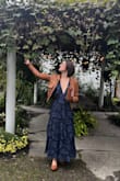 I wore this to an outdoor October wedding. It hung just right and with the help of some fashion tape at the bottom of the neckline, a bra was not necessary for me. So many compliments on the fit and color. I can't wait to wear it again! - Nika O.