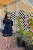 I wore this for my nephew's 5th birthday and it's perfect in every way. Well-made material and perfect to wear during an outdoor Fall event as well. - EKTA P.
